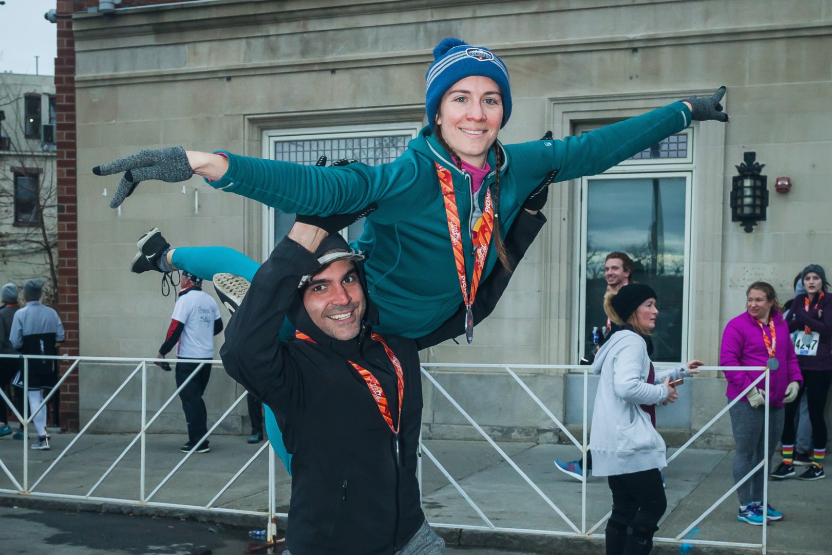 Participants Acrobatically Pose During Troy Turkey Trot